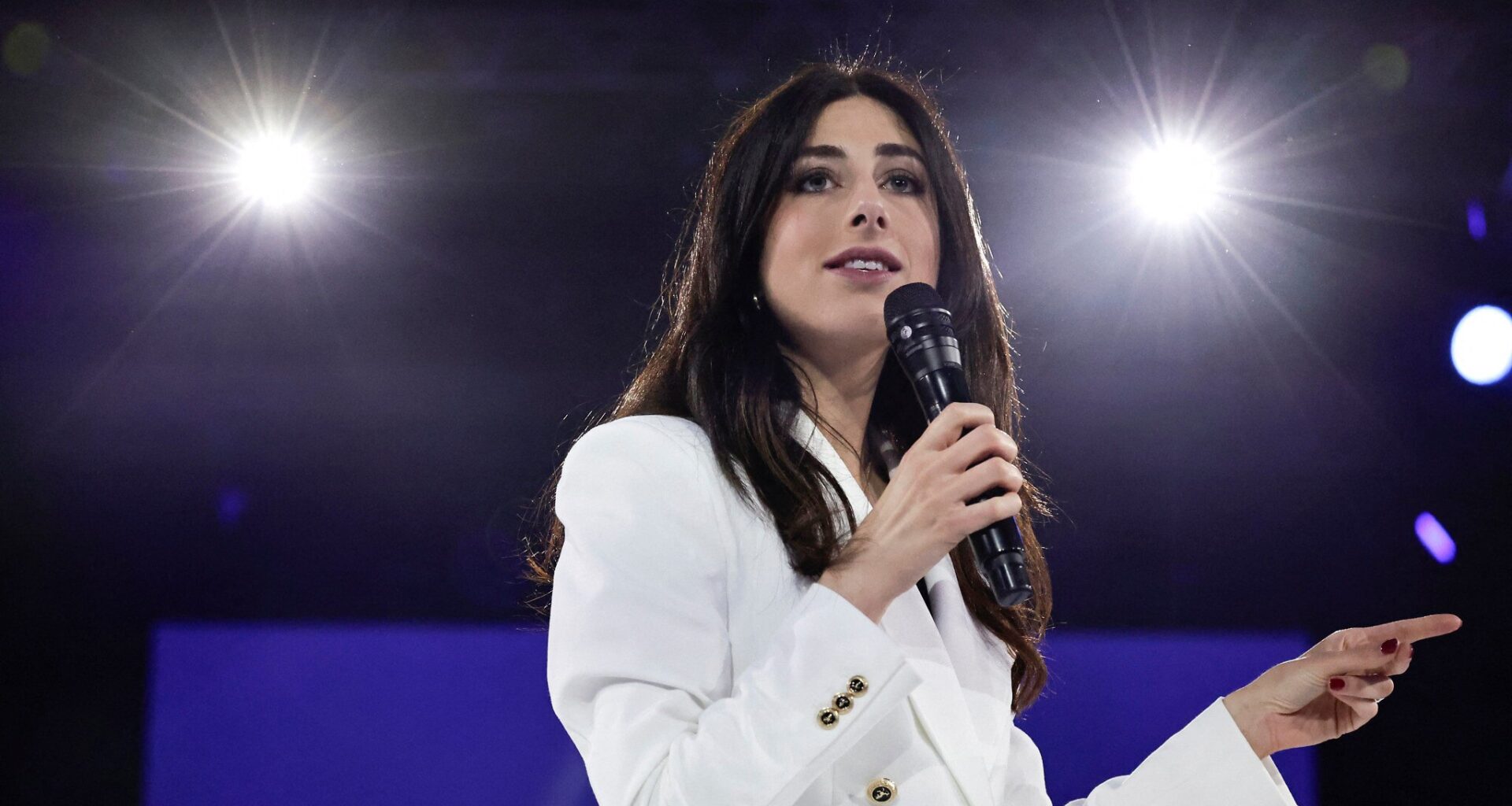 Shannon Seban, Renaissance party candidate for the European Parliament election, addresses an audience in Aubervilliers, northeastern suburbs of Paris, on June 1, 2024, ahead of the European Parliament elections. (Stephane De Sakutin / AFP)