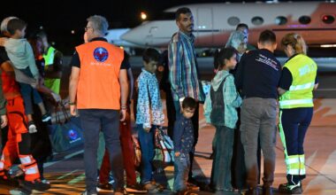 Medics and health personnel welcome Palestinian children from Gaza and their families brought for medical care at Rome's Ciampino airport. (Andreas SOLARO / AFP)