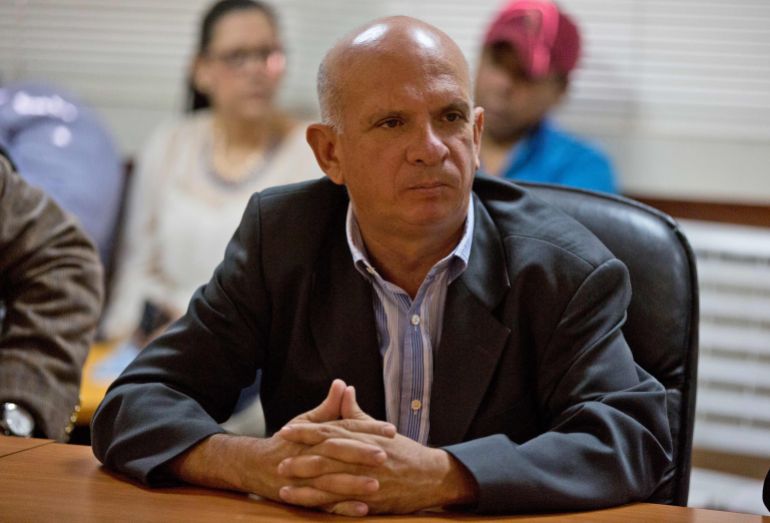 Hugo Cavajal attends a meeting.