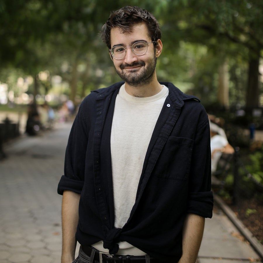 Adam Aleksic in urban park setting
