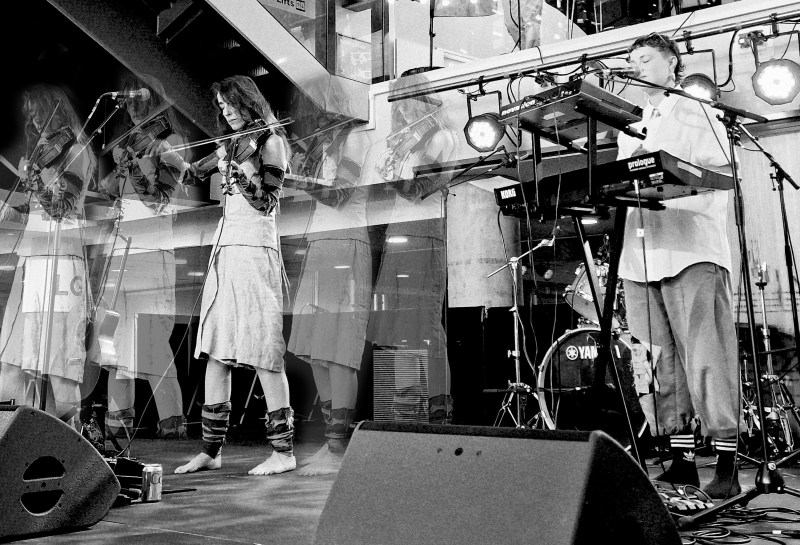 A photograph of Boci and t l k  on stage at the Bristol Beacon