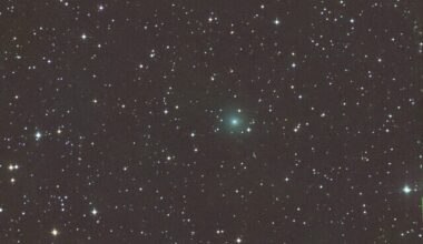 5 bright comets: Dark sky with stars and a fuzzy, bluish spot near the center.