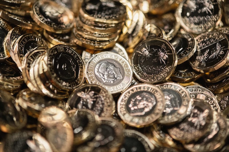 The King Charles III £1 coins in production