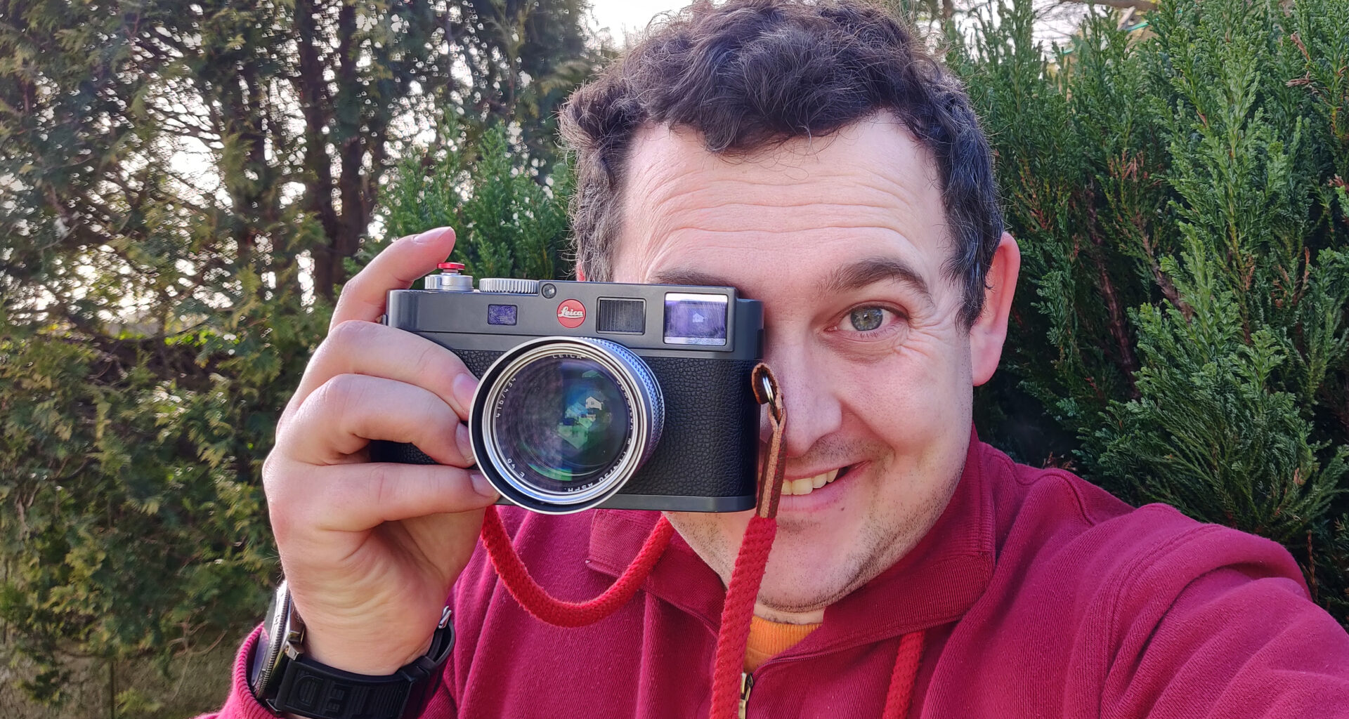 Leica M-E being held in the hand