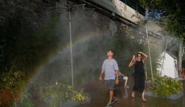 Southwest France swelters under a heat wave as fire crews guard smoldering vineyards