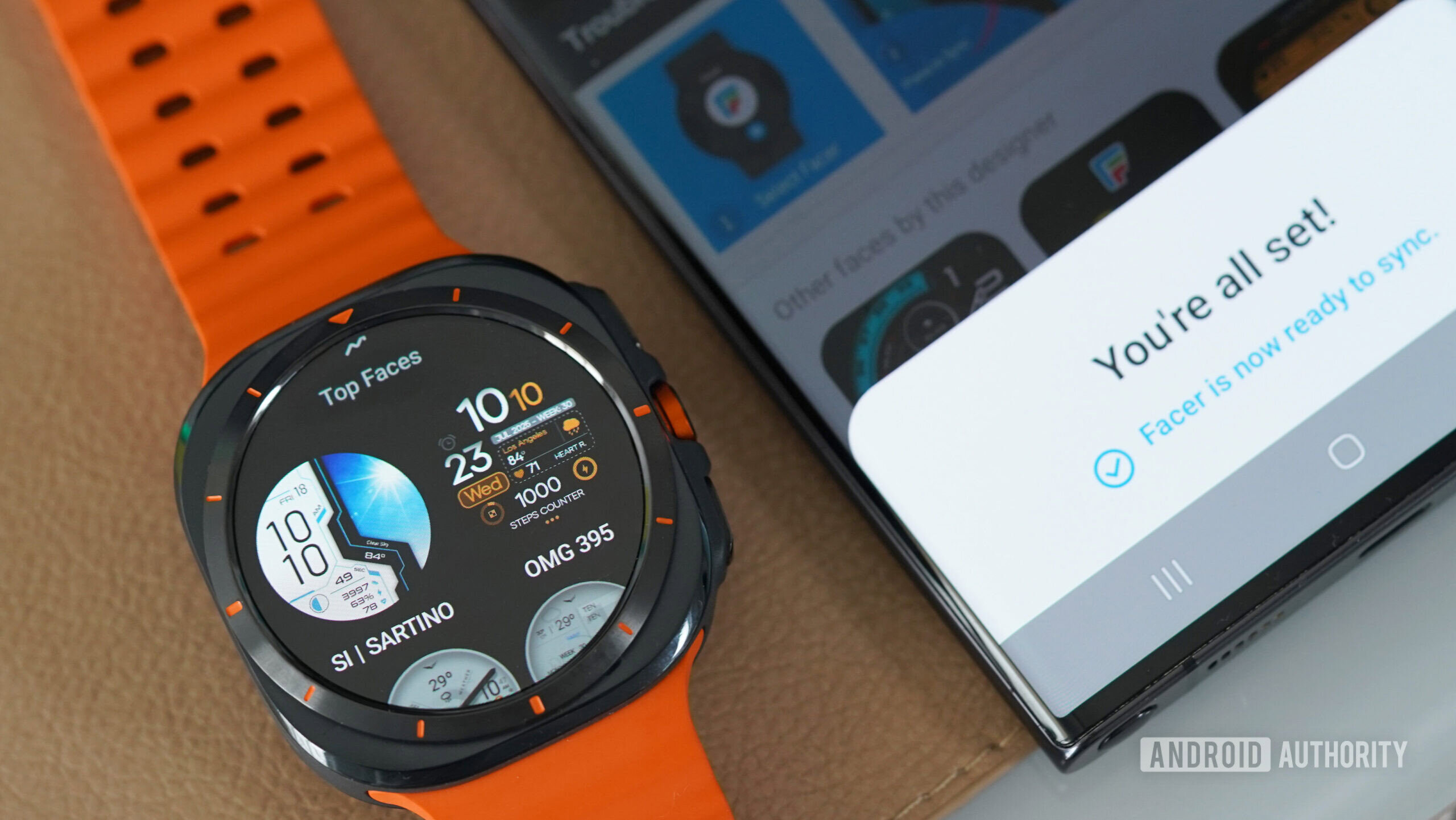A Galaxy Watch Ultra user syncs faces from the Facer app.