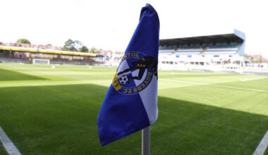 Bristol Rovers corner flag set against a sunny and empty Memorial Stadium