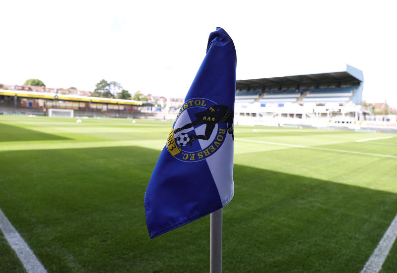 Bristol Rovers corner flag set against a sunny and empty Memorial Stadium