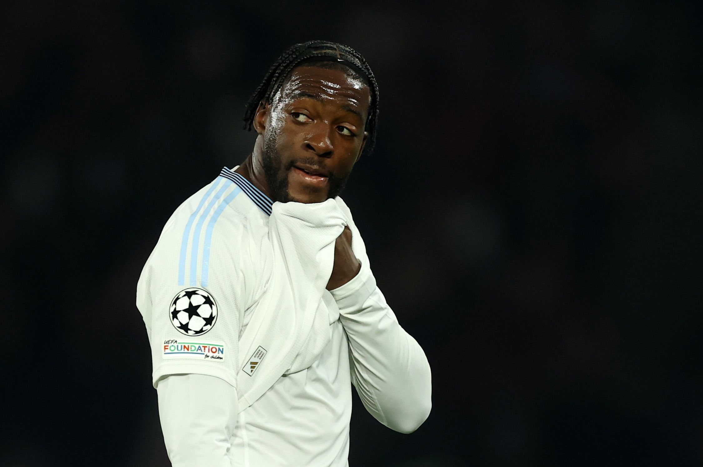 Axel Disasi in action for Aston Villa against PSG.