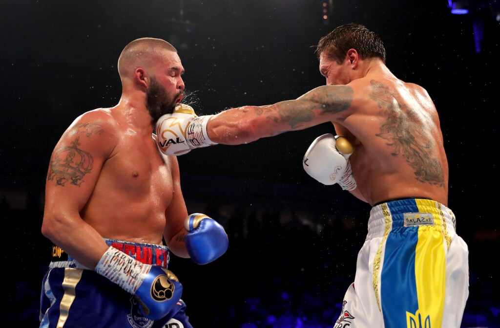Oleksandr Usyk punches Tony Bellew