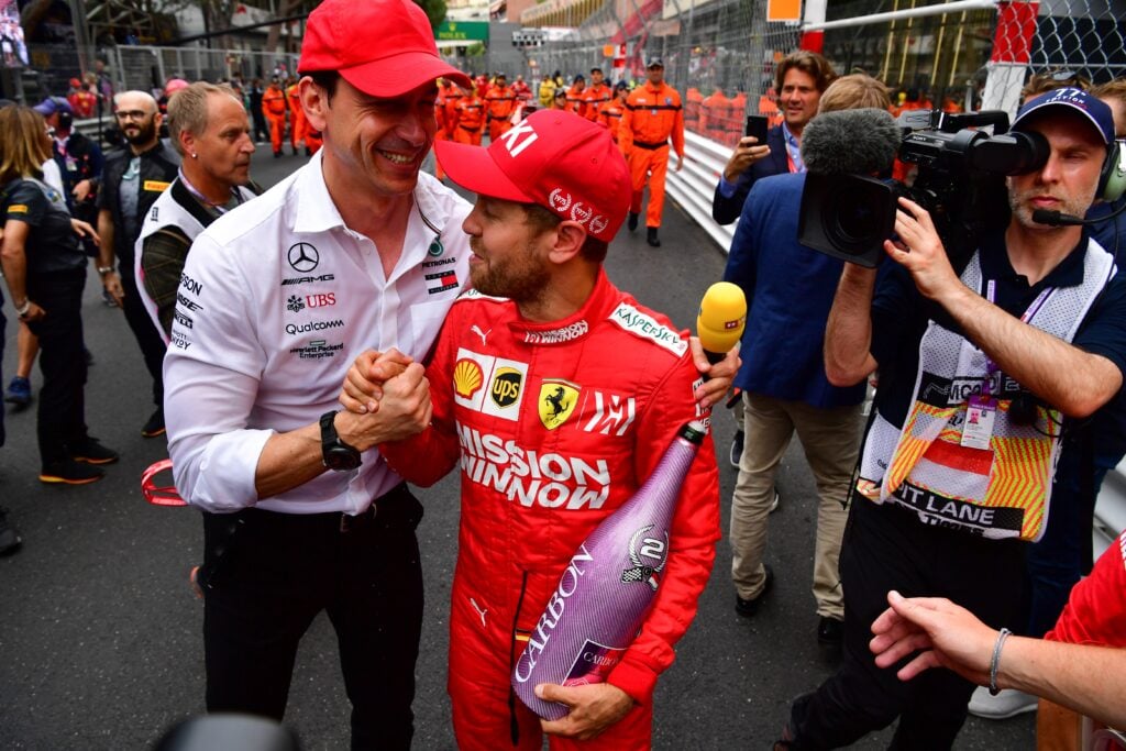 Mercedes team principal Toto Wolff greets Ferrari driver Sebastian Vettel at the 2019 Monaco Grand Prix