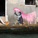 A mural by British street artist Banksy, of a child holding a pink flare, is pictured on August 27, 2019 on a building in Venice. (Photo by Vincenzo PINTO / AFP) / RESTRICTED TO EDITORIAL USE - MANDATORY MENTION OF THE ARTIST UPON PUBLICATION - TO ILLUSTRATE THE EVENT AS SPECIFIED IN THE CAPTION        (Photo credit should read VINCENZO PINTO/AFP via Getty Images)