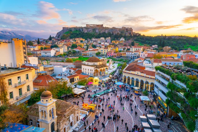 A colourful aerial view of Acropolis of Athens and the old town of Plaka, in Greece.