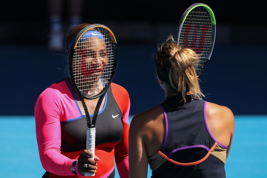 Serena Williams and Aryna Sabalenka meet at the net