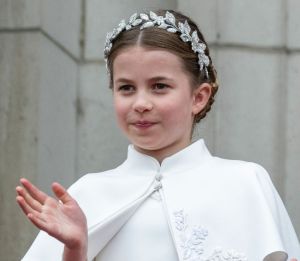 LONDON, ENGLAND - MAY 6: Princess Charlotte of Wales on the balcony of Buckingham Palace during the Coronation of King Charles III and Queen Camilla on May 6, 2023 in London, England. The Coronation of Charles III and his wife, Camilla, as King and Queen of the United Kingdom of Great Britain and Northern Ireland, and the other Commonwealth realms takes place at Westminster Abbey today. Charles acceded to the throne on 8 September 2022, upon the death of his mother, Elizabeth II. (Photo by UK Press Pool/UK Press via Getty Images)