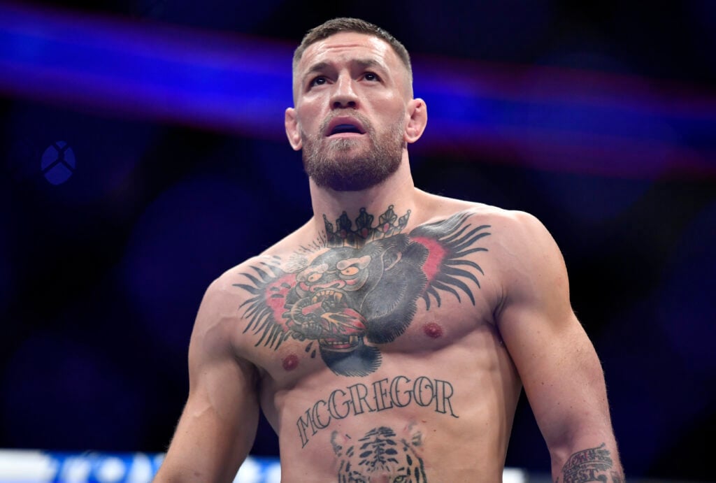Conor McGregor enters the Octagon for his fight against Dustin Poirier at UFC 264