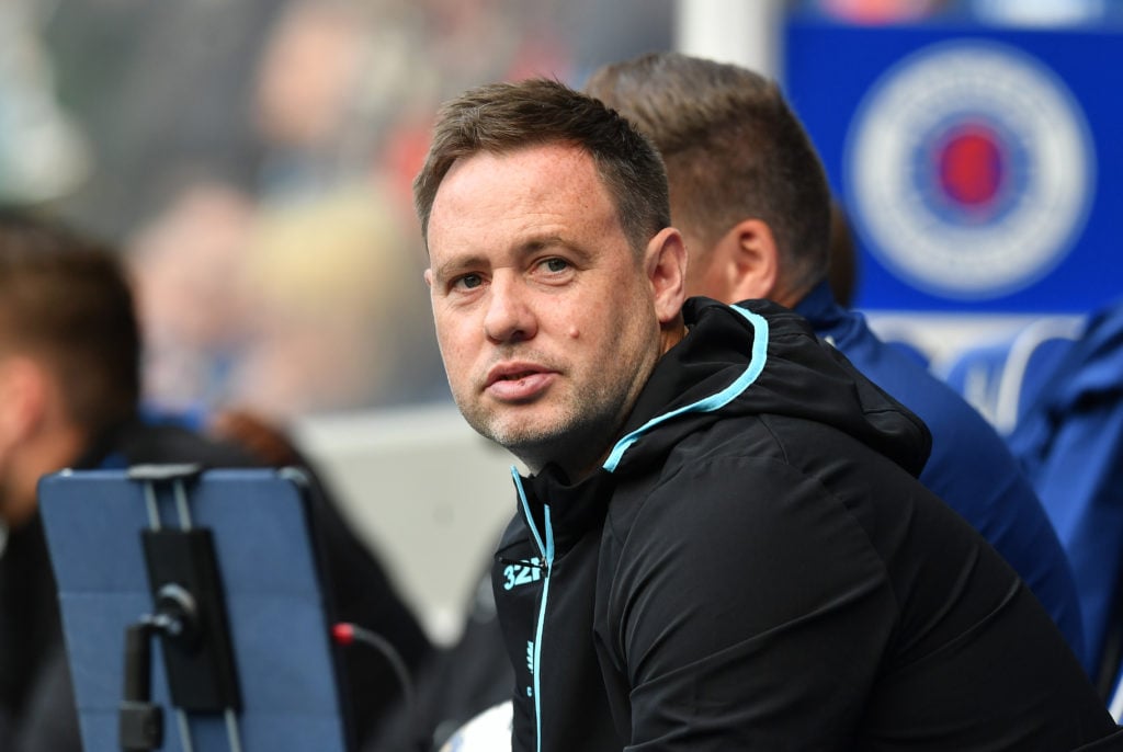Rangers boss Michael Beale looks on