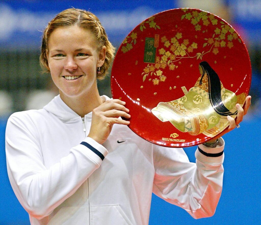 Lindsay Davenport of the US smiles as she holds the winner's trophy during an awards ceremony following the final match against compatriot Monica Seles in the Pan Pacific Open tennis tournament in Tokyo, 02 February 2003. Davenport claimed her first title in 15 months when she edged past Seles 6-7 (6/8), 6-1, 6-2 in a battle between former world number ones.