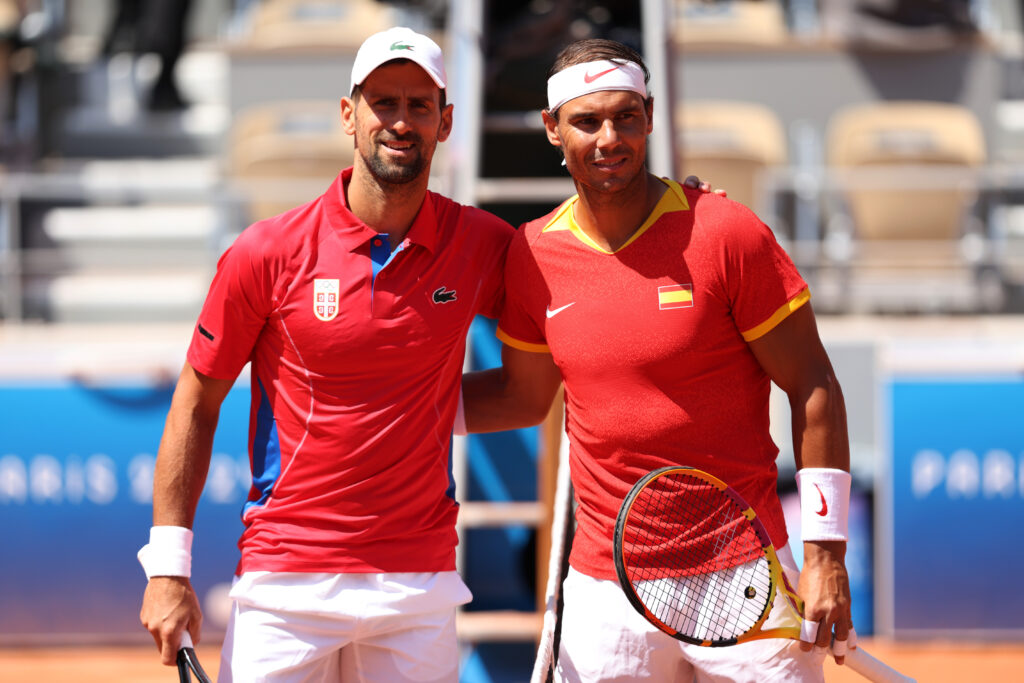 Novak Djokovic of Team Serbia (L) and Rafael Nadal of Team Spain pose for a photo ahead of the Men's Singles second round match on day three of the Olympic Games Paris 2024 at Roland Garros on July 29, 2024 in Paris, France.