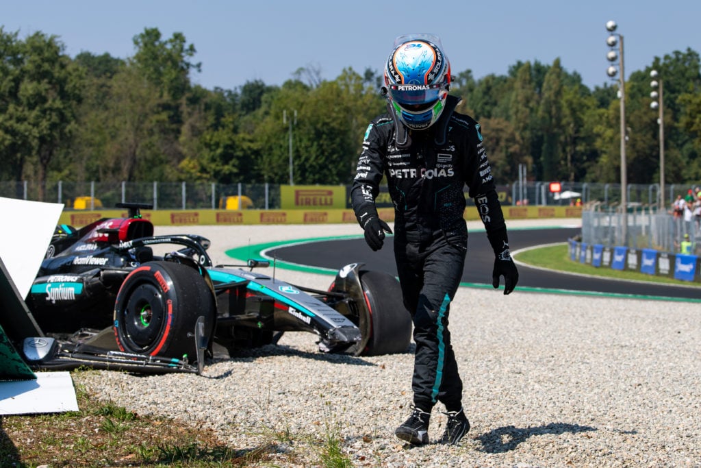 Kimi Antonelli walking away from the Mercedes W15 after crashing in during FP1 of the Italian Grand Prix in 2025