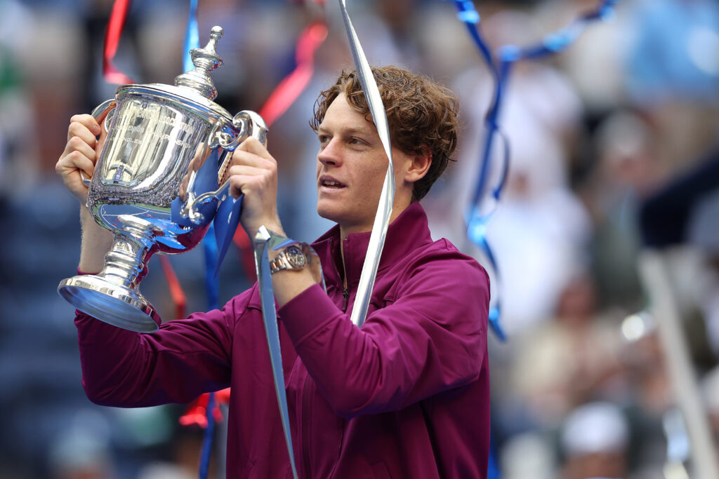 Jannik Sinner of Italy celebrates with the winners trophy after defeating Taylor Fritz of the United States to win the Men's Singles Final on Day Fourteen of the 2024 US Open at USTA Billie Jean King National Tennis Center on September 08, 2024 in the Flushing neighborhood of the Queens borough of New York City.