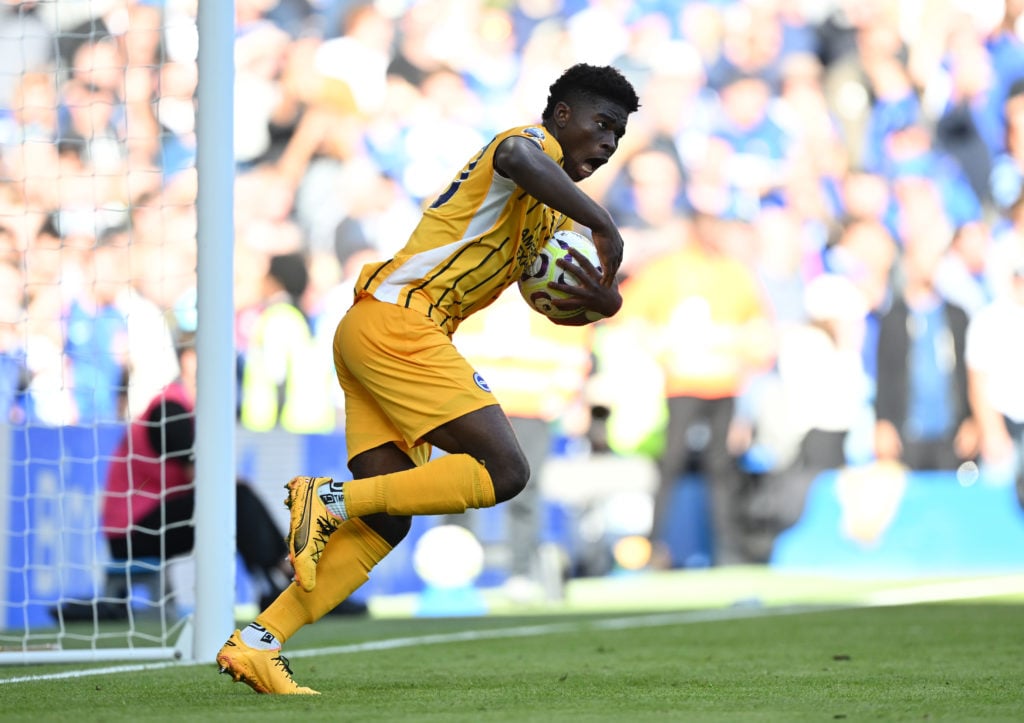 Carlos Baleba runs with the ball after scoring for Brighton vs Chelsea