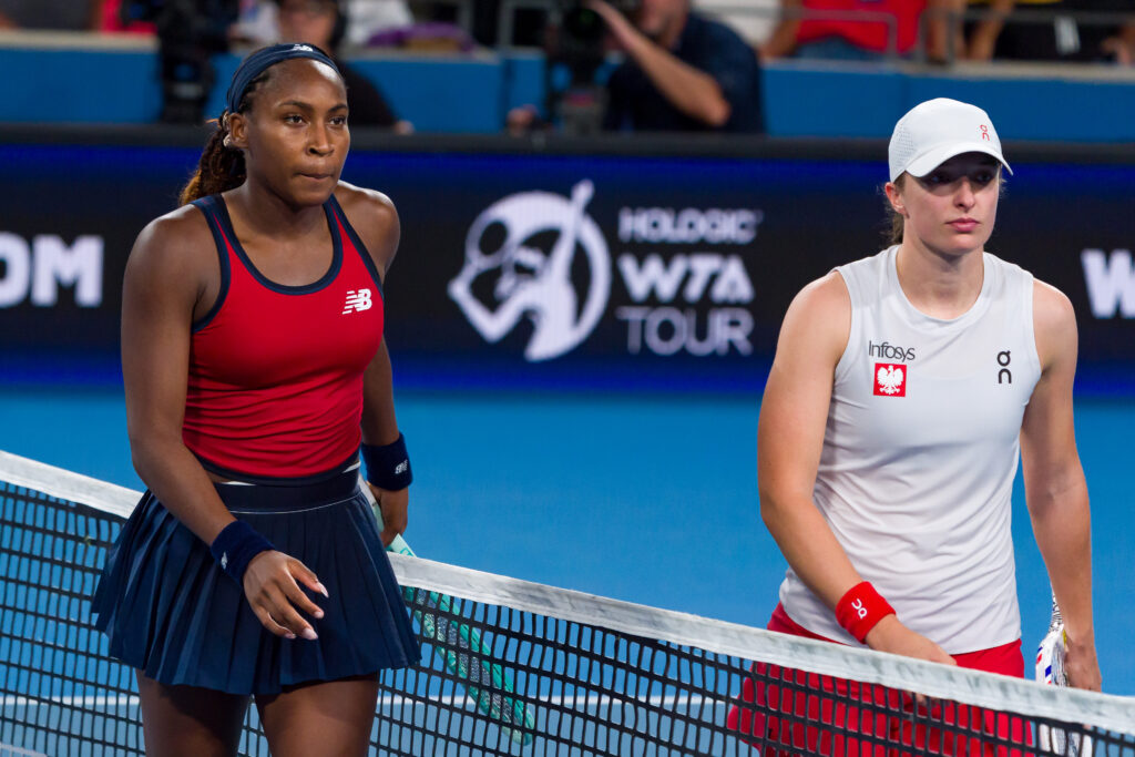 Coco Gauff (L) of United States shakes hands with Iga Swiatek (R) of Poland after victory in the United Cup Final during day 10 of the 2025 United Cup at Ken Rosewall Arena on January 05, 2025 in Sydney, Australia.