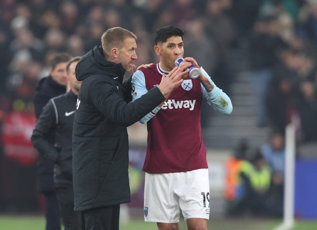 West Ham head coach Graham Potter talks to midfielder Edson Alvarez