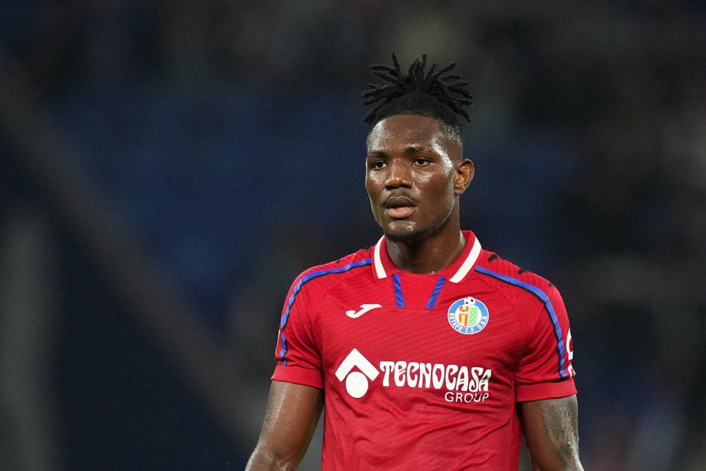 Close up image of Christantus Uche in action for Getafe against Barcelona.