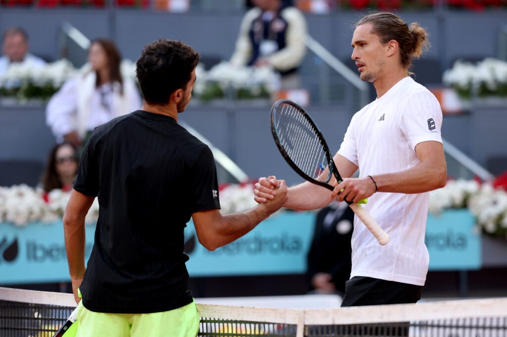 Alexander Zverev and Francisco Cerundolo shake hands after their match at the 2025 Mutua Madrid Open