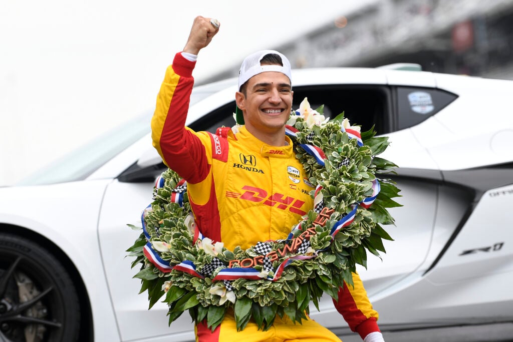 Alex Palou celebrating winning his fourth IndyCar championship