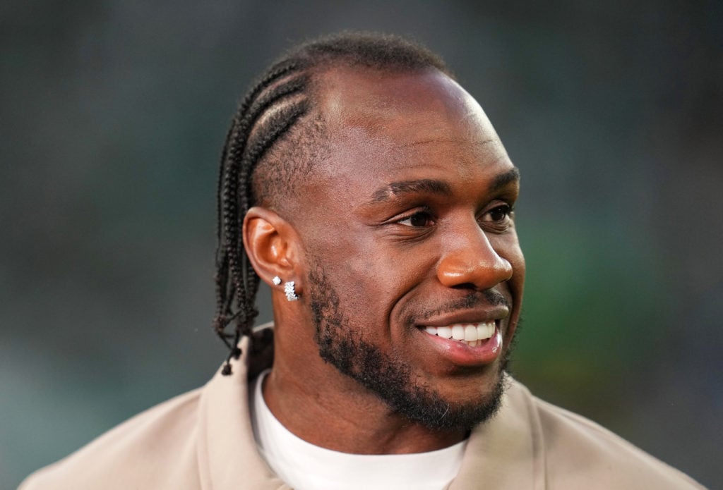 Michail Antonio of West Ham United looks on, while presenting for TNT Sports.