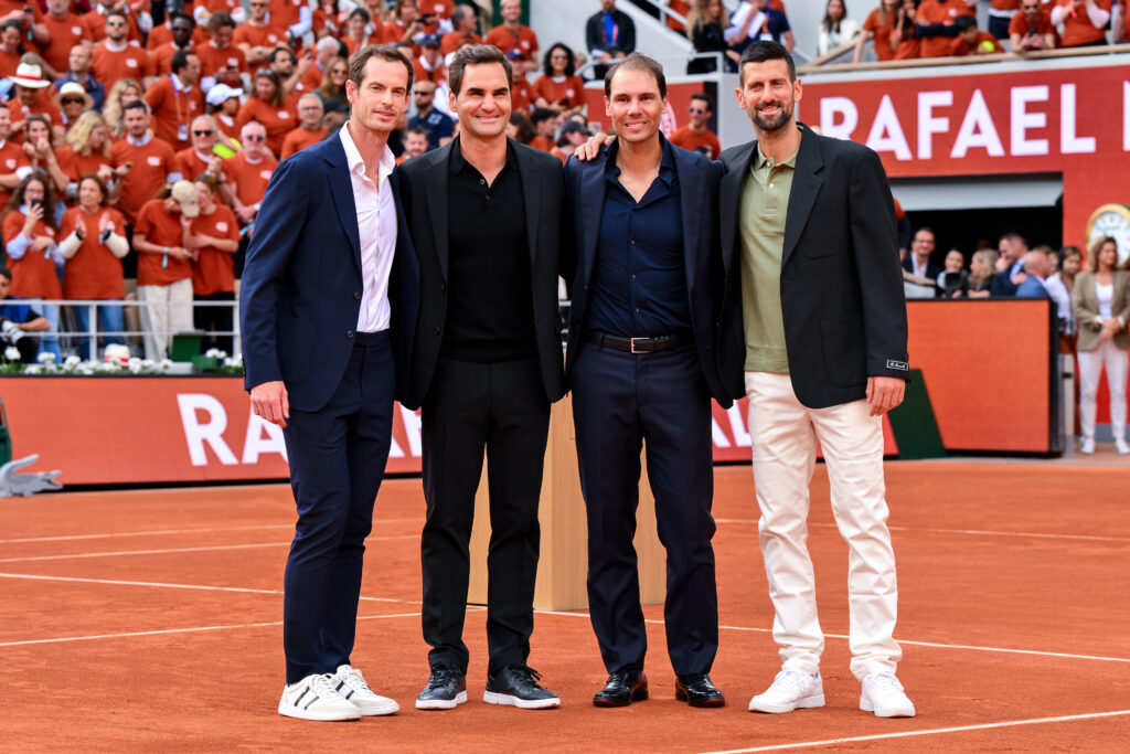 Rafael Nadal poses for a photo with Roger Federer, Novak Djokovic and Andy Murray on Court Philippe-Chatrier during a ceremony held in his honour on Day One of the 2025 French Open at Roland Garros on May 25, 2025 in Paris, France.