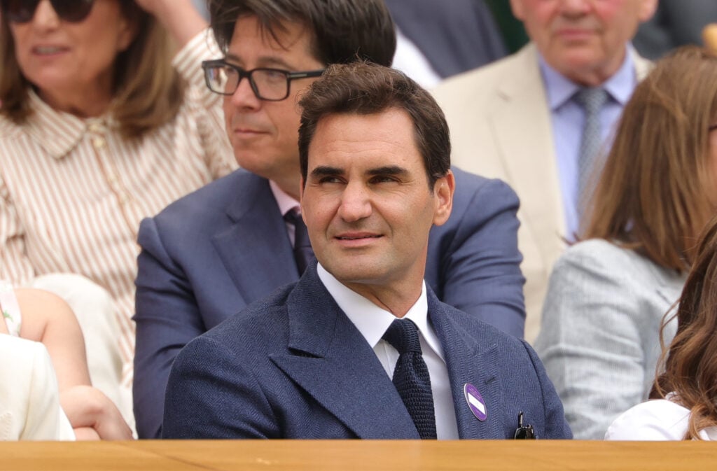 Roger Federer, looks on in the Royal Box prior to the Gentlemen's Singles fourth round match between Alex De Minaur of Australia and Novak Djokovic of Serbia on day eight of The Championships Wimbledon 2025 at All England Lawn Tennis and Croquet Club.