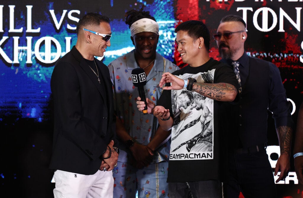 Tony Ferguson and Salt Papi face off with KSI standing between them and Dan Hardy holding the microphone