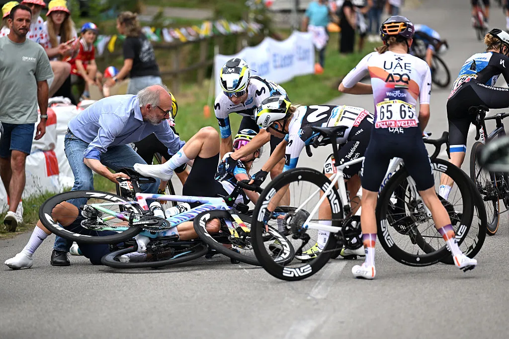 PLUMELEC, FRANCE - JULY 26: (L-R) Liane Lippert of Germany, Marlen Reusser of Switzerland, Mareille Meijering of Netherlands and Team Movistar and Maeva Squiban of France and UAE Team ADQ after being involved in a crash during the 4th Tour de France Femmes 2025, Stage 1 a 78.8km stage from Vannes to Plumelec / #UCIWWT / on July 26, 2025 in Plumelec, France. (Photo by Szymon Gruchalski/Getty Images)