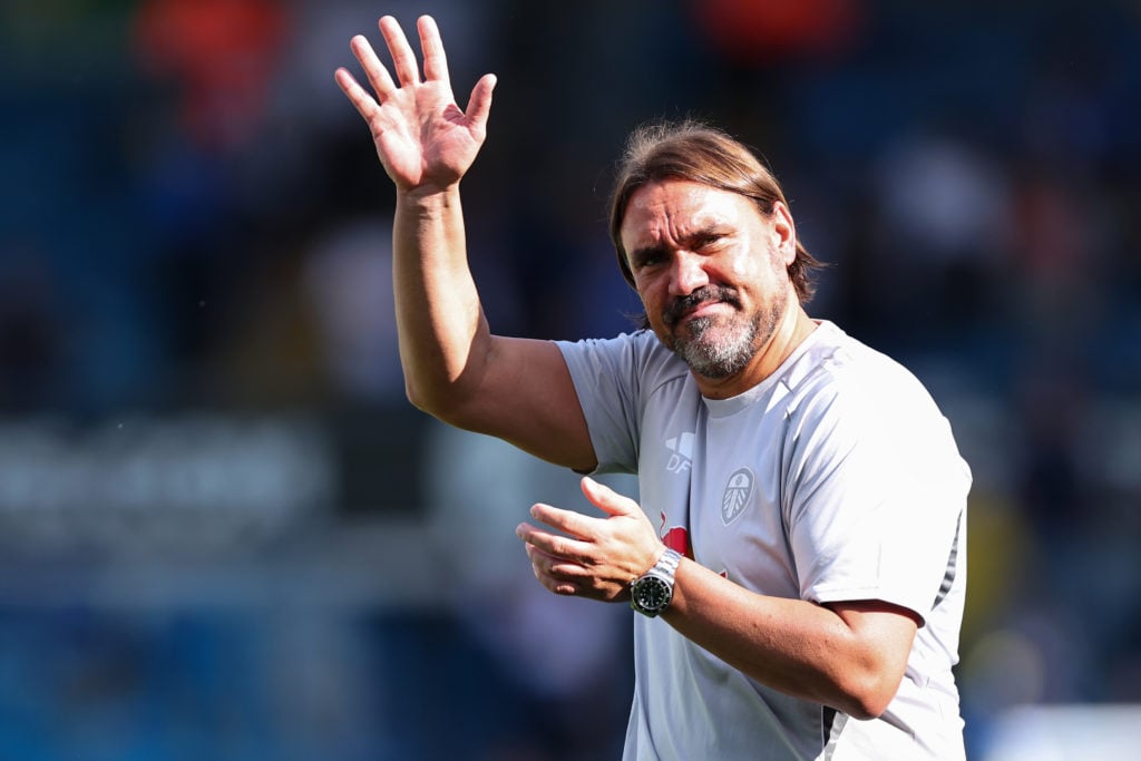 Daniel Farke waves to Leeds fans during Villarreal clash.