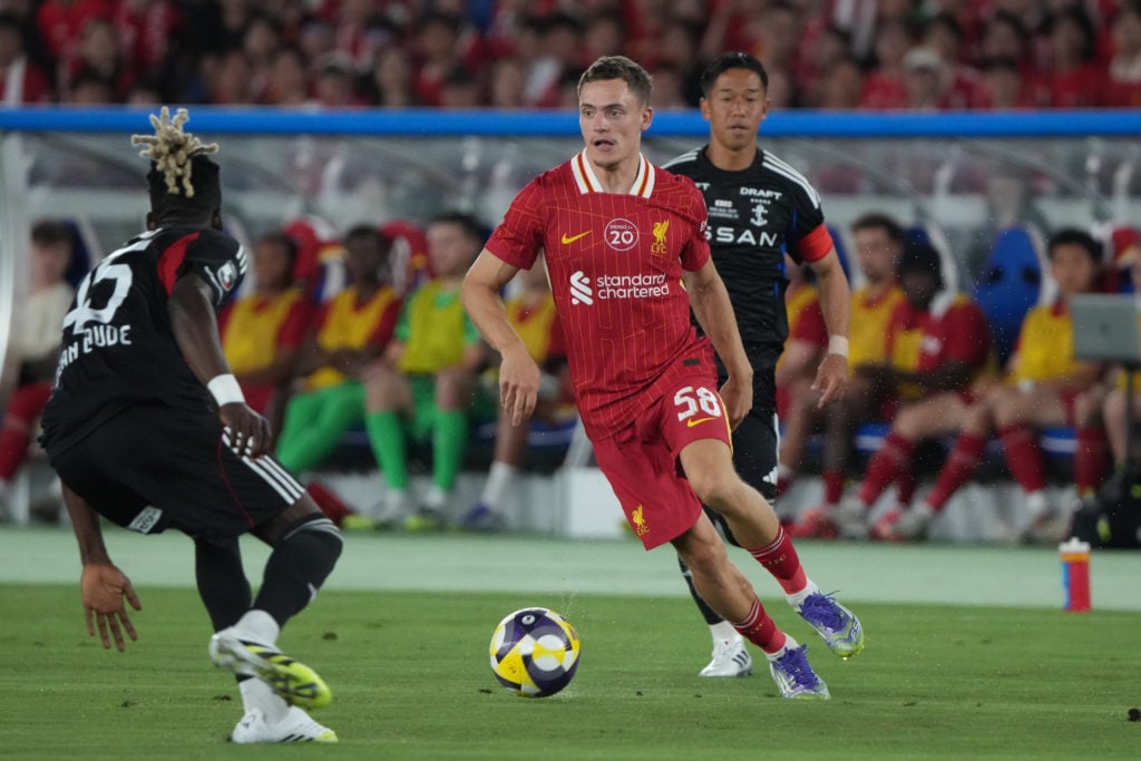 Florian Wirtz runs with the ball during Liverpool's pre-season friendly against Yokohama F. Marinos