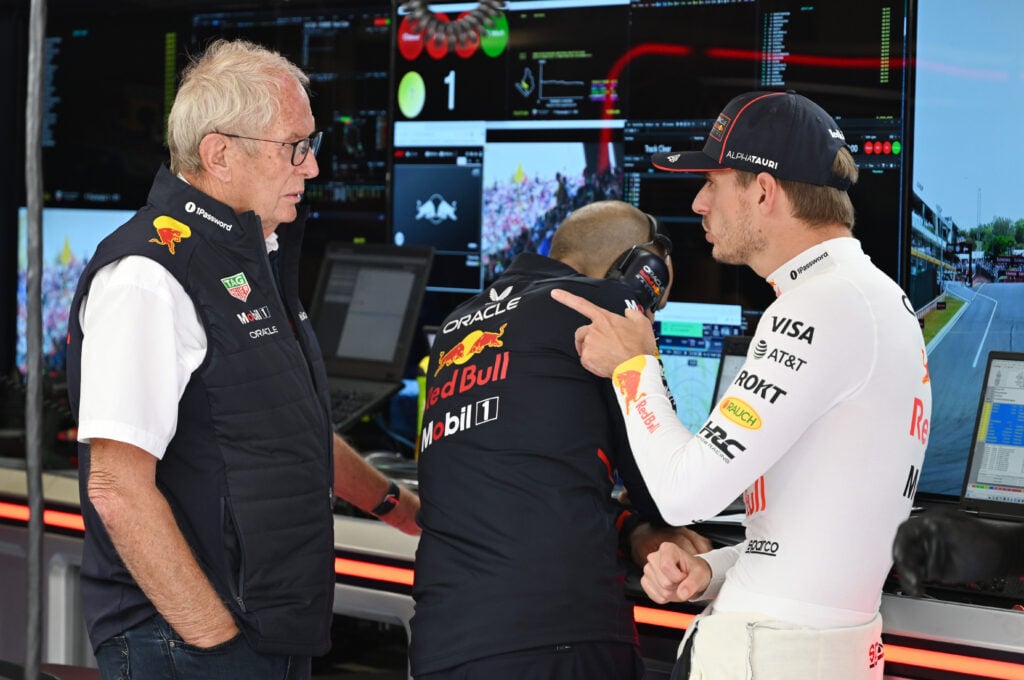 Helmut Marko and Red Bull driver Max Verstappen in discussions during the 2025 Formula 1 Hungarian Grand Prix