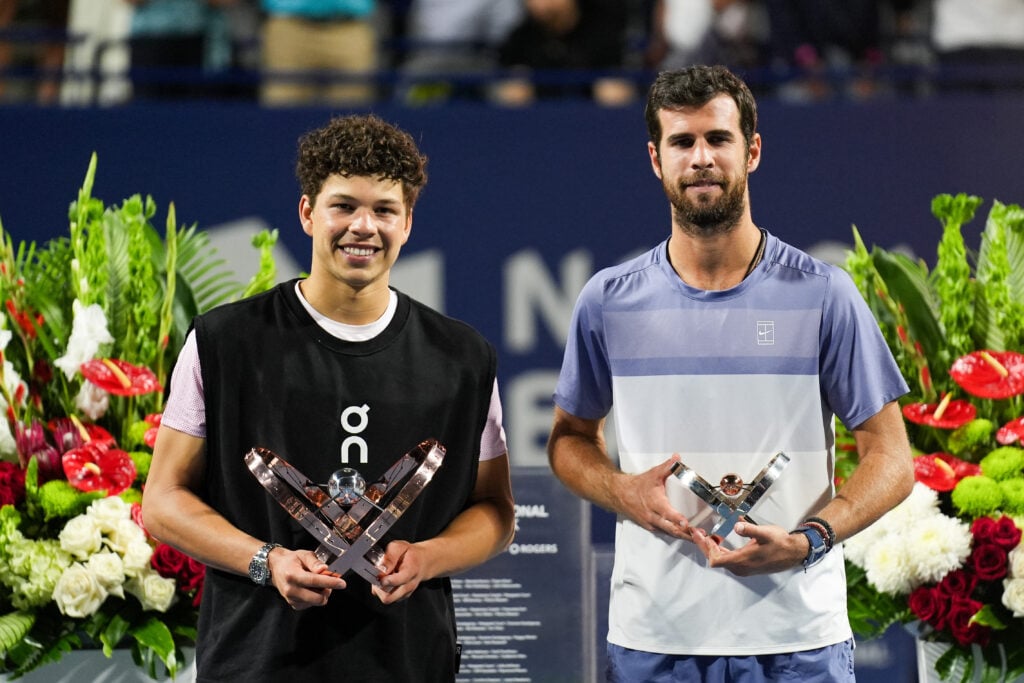 Ben Shelton and Karen Khachanov with their trophies after the Canadian Open final.
