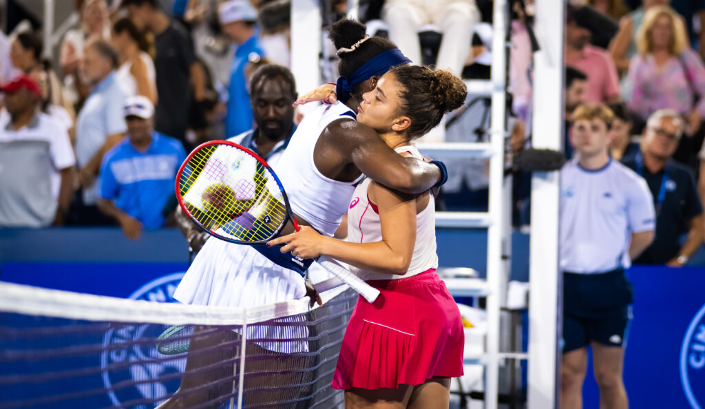 Jasmine Paolini of Italy and Coco Gauff of the United States embrace at the net after the quarter-final on Day 9 of the Cincinnati Open at Lindner Family Tennis Center on August 15, 2025 in Mason, Ohio