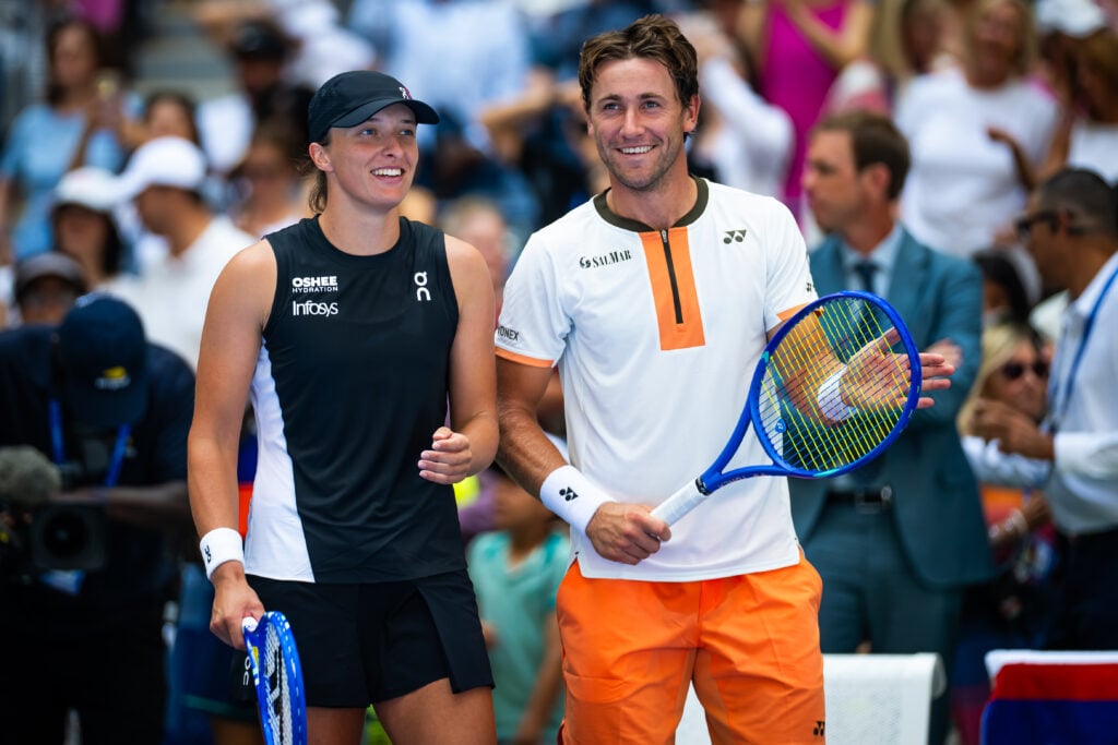 Iga Swiatek and Casper Ruud celebrate their first-round win at the 2025 US Open mixed doubles event