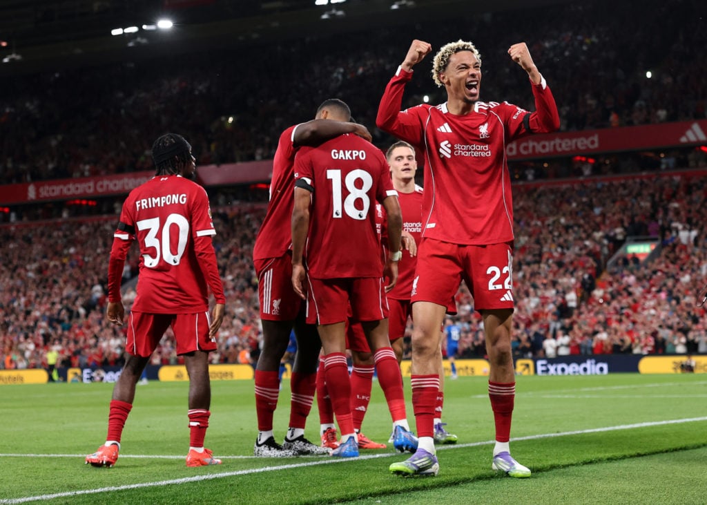 Hugo Ekitike of Liverpool celebrates his team's second goal scored by teammate Cody Gakpo during the Premier League match between Liverpool and Bournemouth at Anfield