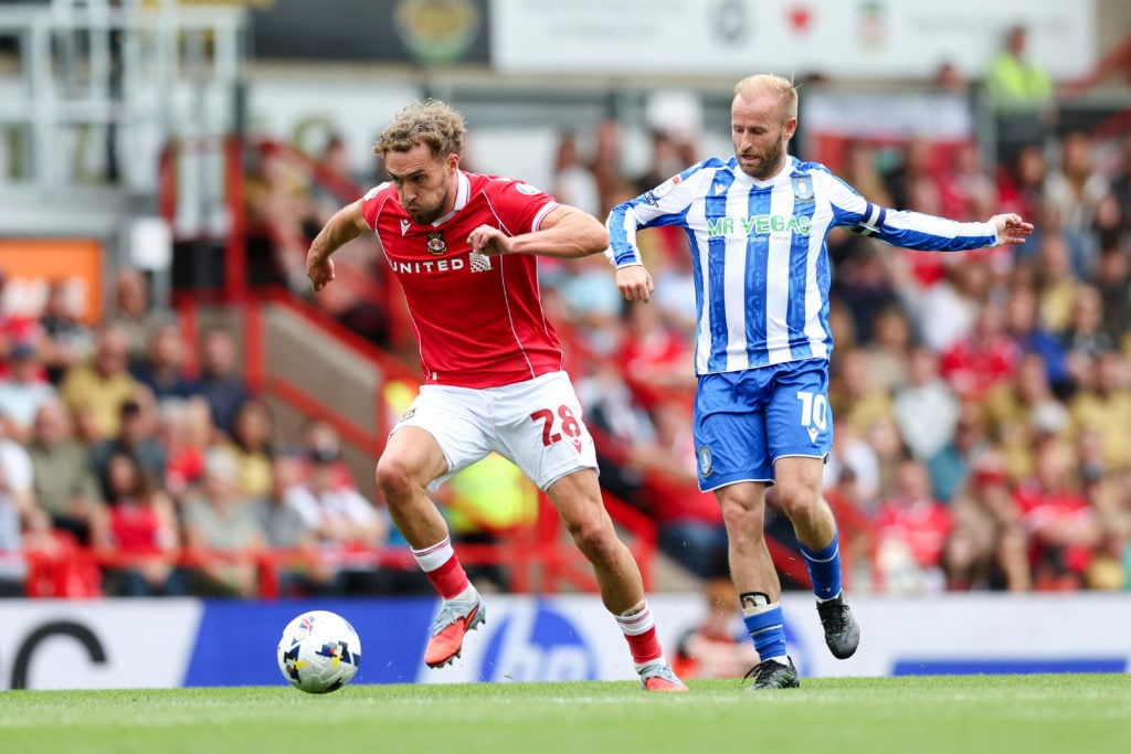 Sam Smith and Barry Bannan during Wrexham AFC v Sheffield Wednesday - Sky Bet Championship