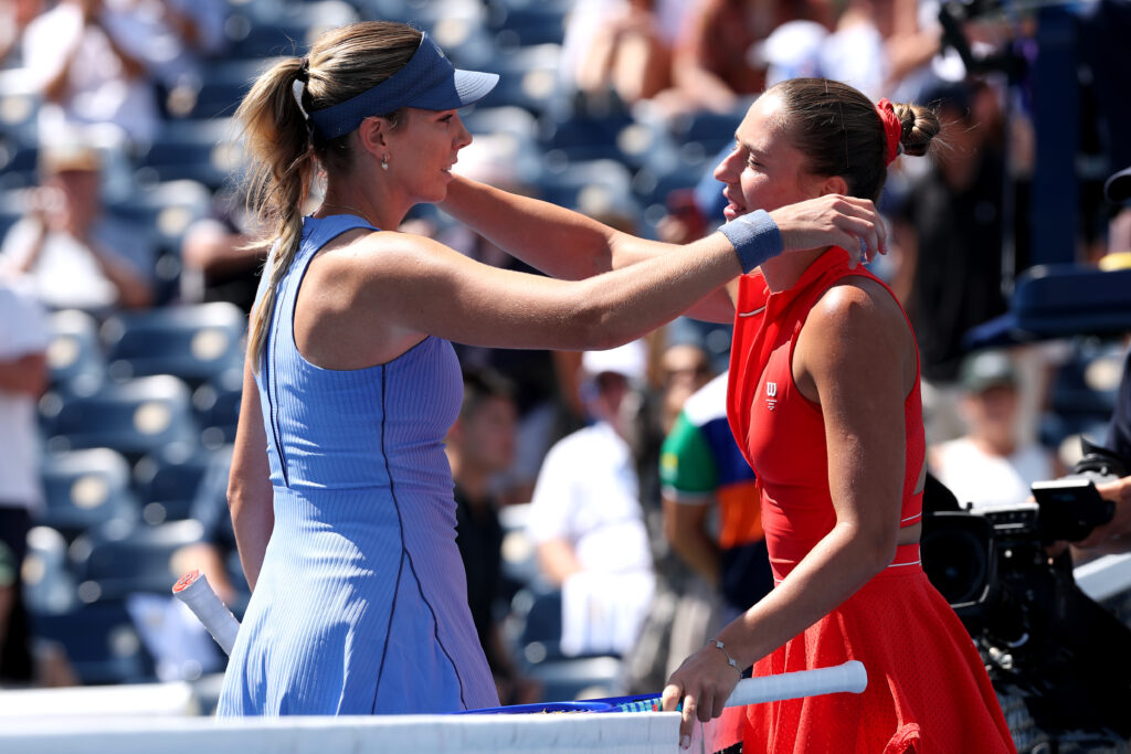 Marta Kostyuk of Ukraine, right, hugs Katie Boulter of Great Britain after winning their Women's Singles First Round match on Day Three of the 2025 US Open at USTA Billie Jean King National Tennis Center on August 26, 2025 in the Flushing neighborhood of the Queens borough of New York City.
