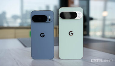 Google Pixel 10 Pro in Moonstone next to Google Pixel 10 Pro XL in Jade head on standing upright