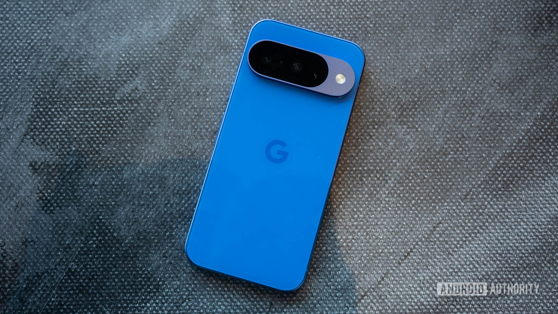 Google Pixel 10 in Indigo flat on table