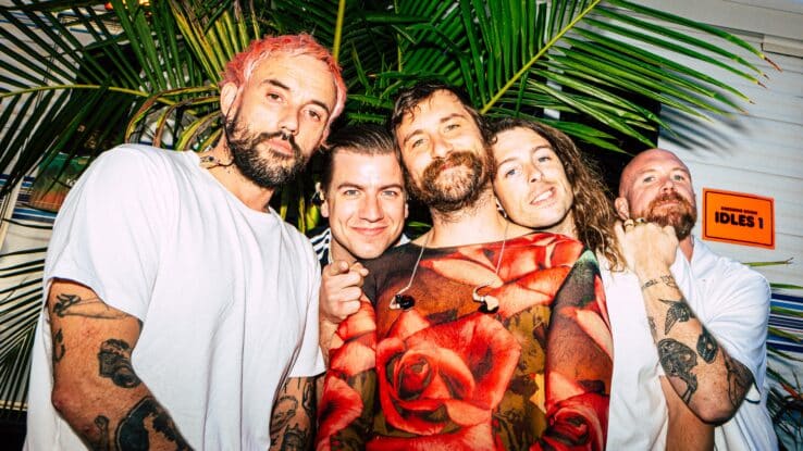 A promotional image of the post-punk band IDLES.