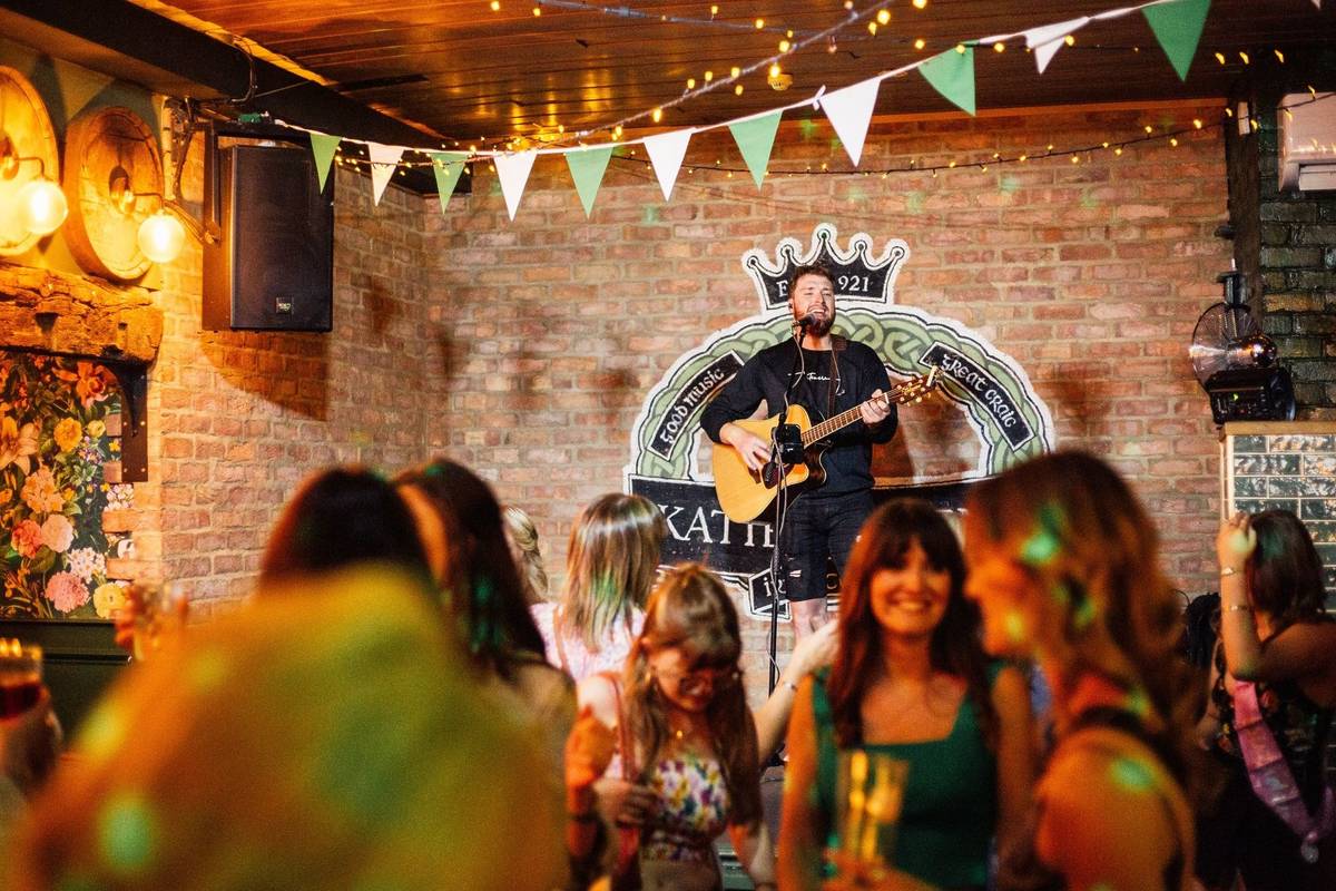 A musician performing at Katie O'Brien's