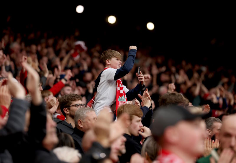 Liverpool fans support their team at Anfield